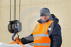 Portrait of installer at unloading ice blocks