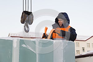Portrait of installer at unloading ice blocks