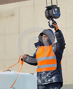 Portrait of installer at unloading ice blocks