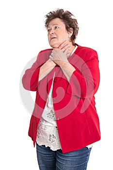 Portrait: Isolated older woman in red has sore throat.