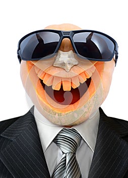 Portrait of Jack Lantern from pumpkin in black business suit.