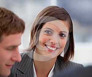 Portrait of a jolly businesswoman in a meeting