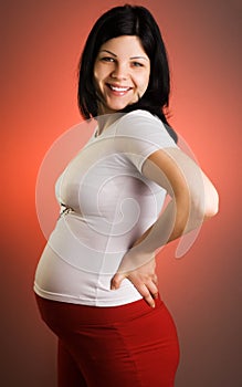 Portrait of joyful beautiful pregnant woman