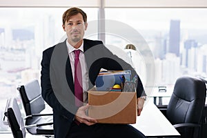 Portrait Just Hired Business Man With Crate Box Smiling