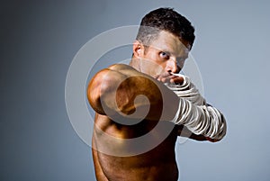 Portrait of a kick boxer in fighting stance
