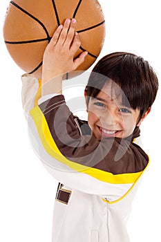 Portrait of a kid throwing ball at camera