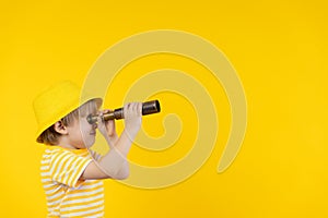 Portrait of kid wearing protective mask against yellow background