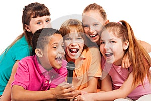 Portrait of kids singing together