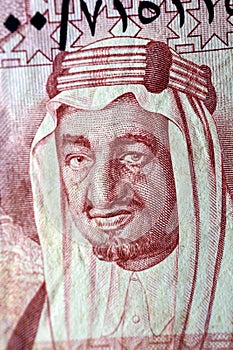 King Faisal Bin AbdulAziz, former king of Saudi Arabia from the obverse side of 1 one Saudi riyal banknote bill currency photo