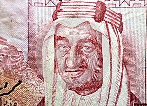 King Faisal Bin AbdulAziz, former king of Saudi Arabia from the obverse side of 1 one Saudi riyal banknote bill currency photo