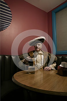 Portrait of King Henry VIII eating lunch in cafe