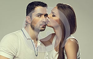 Portrait of kissing couple