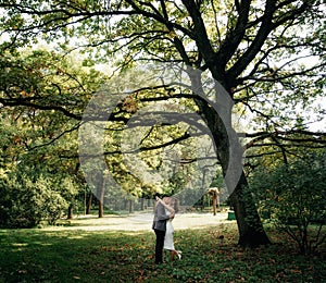 Portrait of kissing couple in the garden