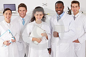 Portrait Of Laboratory Technicians Standing In Group