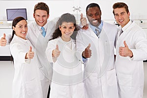 Portrait Of Laboratory Technicians Standing In Group