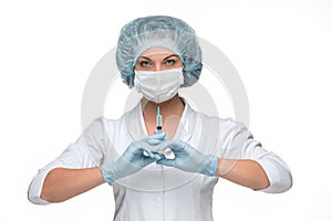 Portrait of lady surgeon showing syringe over