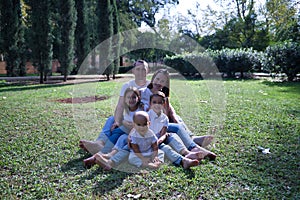 Portrait of a large family of five members, father, mother and three children, one of whom is a transsexual girl. Family concept,