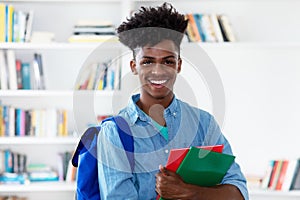 Portrait of laughing african american male student