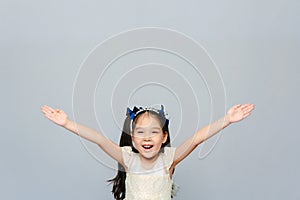 Portrait of a laughing cute 6 years old Asian girl