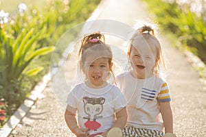 Portrait of a laughing girl with Down syndrome and girlfriends