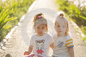 Portrait of a laughing girl with Down syndrome and girlfriends