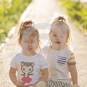 Portrait of a laughing girl with Down syndrome and girlfriends