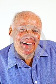 Portrait of laughing happy elderly man