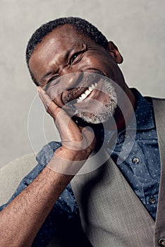 portrait of laughing mature african american man