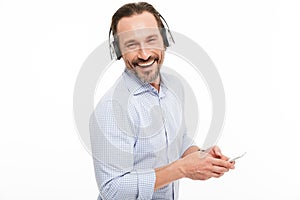 Portrait of a laughing mature man dressed in shirt