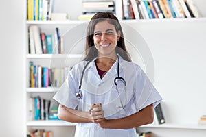 Portrait of laughing mexican nurse or medical student