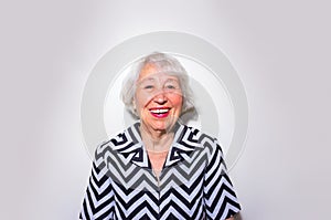 The portrait of a laughing old woman