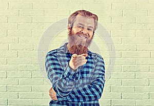 Portrait of a laughing smiling casual blue shirt man looking sho