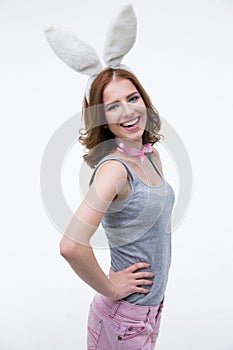 Portrait of a laughing woman with rabbit ears