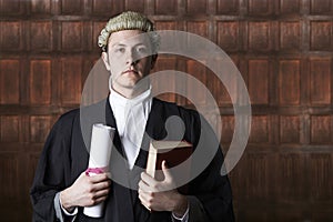 Portrait Of Lawyer In Court Holding Brief And Book