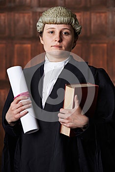 Portrait Of Lawyer In Court Holding Brief And Book