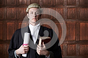 Portrait Of Lawyer In Court Holding Brief And Book