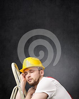 Portrait of a lazy worker with ladder