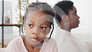 Portrait of little african american girl sad daughter feels disappointment after quarrel with afro mother older sister