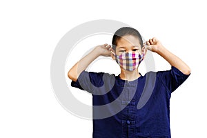 Portrait little asian one cute boy wearing fabric face mask for hygiene protect or prevention from virus, bacteria, germs and air
