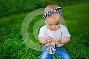 Portrait of a little baby in a denim clothes