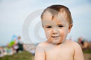 Portrait of a little boy on the beach on a sunny day