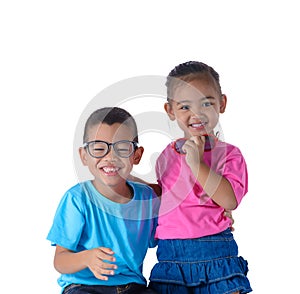 Portrait of little boy and girl is colorful T-shirt with glasses isolated on white background