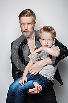 The portrait of a little boy and his father. Fathers day