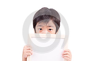 Portrait of a little boy holding a whiteboard