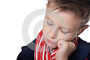 Portrait of little boy posing on white background