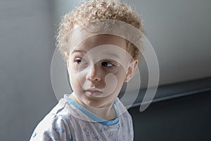 Portrait of little boy in pyjamas before going to sleep