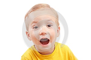 Portrait of a little boy screaming out loud isolated on white