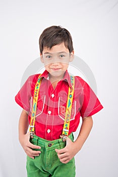 Portrait of little boy wearing colorful cloths