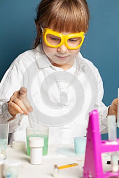 Portrait of little child girl student scientist