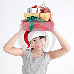 Portrait of little cute asian girl wearing red hat